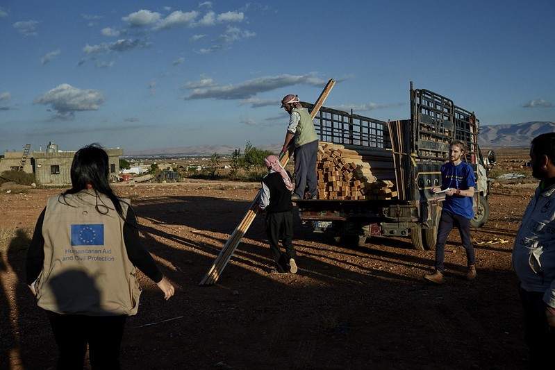 EU Aid volunteers unload a truck in Lebanon